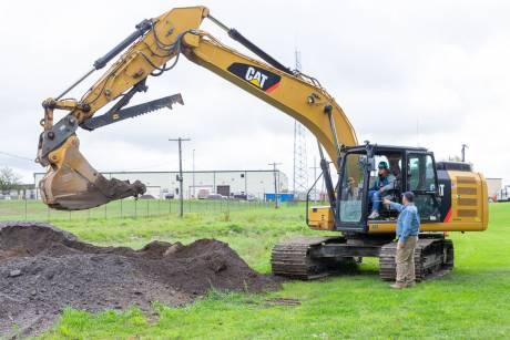 girl_at_excavator.jpeg