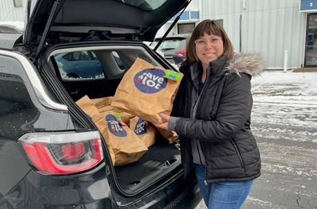 kelly_grimaldi_with_loaded_car_of_save-alot_donations_1-2023.jpg