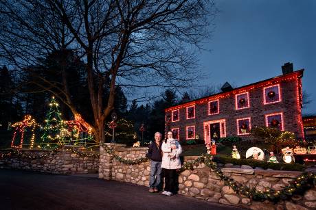 Jim, Connie, and Annabella DiSalvo in front of their home on Fargo Road.