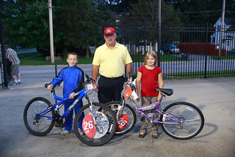 Lions Club President John Murray with drawing winners, 11 year old Joe Biaselli of Lyndonville and 8 year old Olivia Costley of Batavia